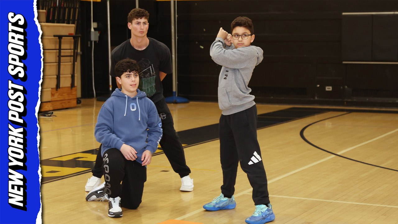 Veteran umpire Mike Herring teaching the next generation