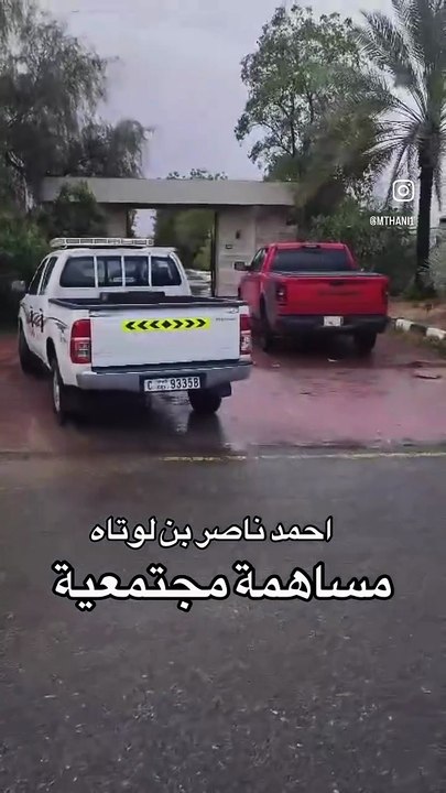 UAE citizen opens home gates to allow cars to bypass heavily flooded street