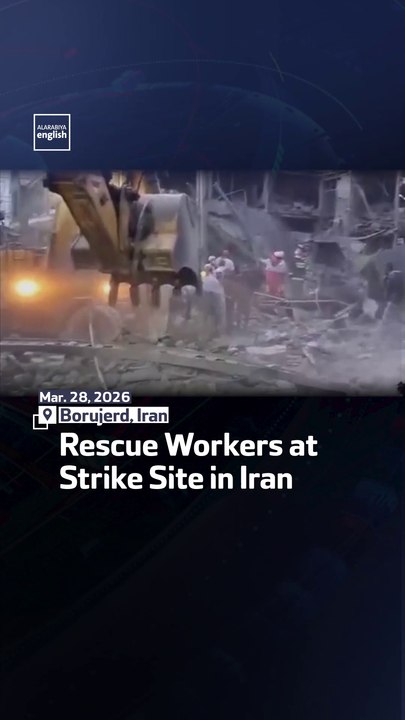 Rescue Workers At Strike Site In Iran