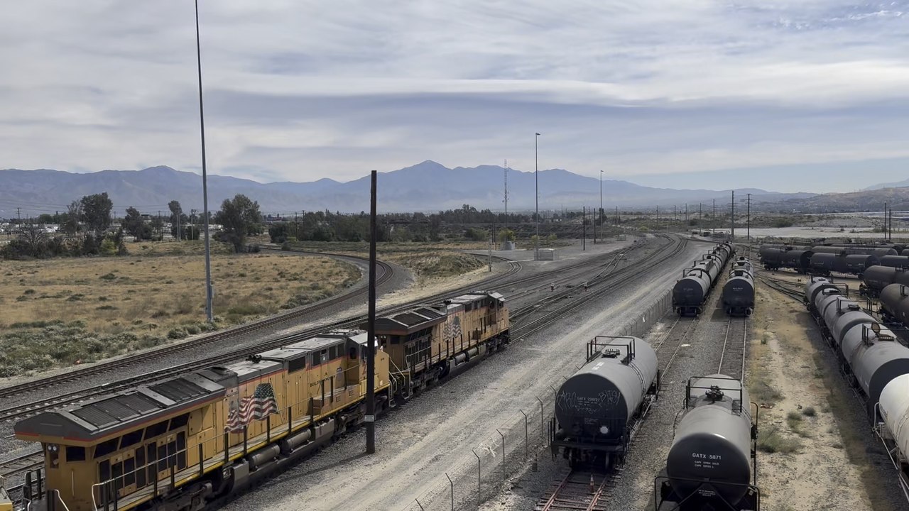 UP 7831 Westbound Manifest Meets UP 5773 Eastbound Intermodal Stack at West Colton Yard.