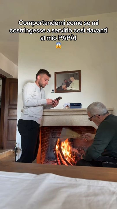 A woman plays a prank by serving her partner submissively.