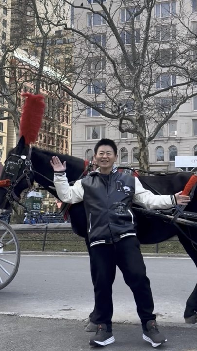 Nelson Wang had a pleasant Saturday in Manhattan and encountered the "No King" march on the street. Photographed by Gonzalez on March 28, 2026.