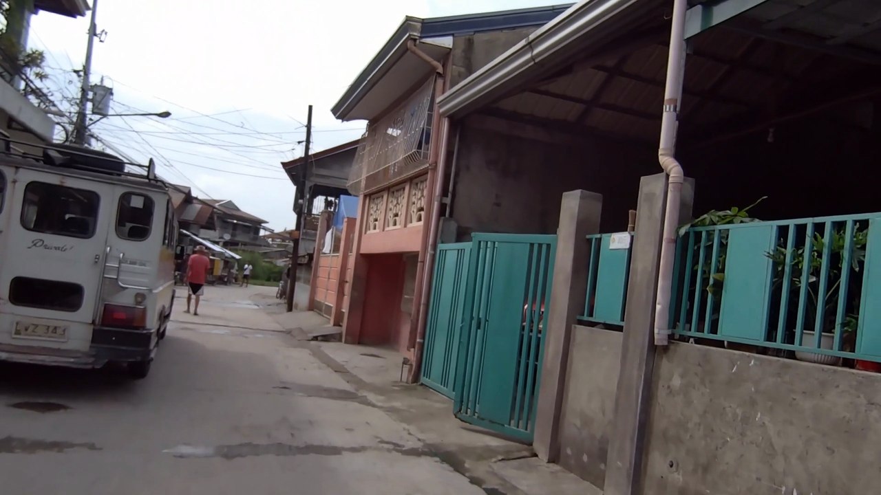 Town Atmosphere on Paralaya Street in Santo Tomas, Pampanga, Philippines