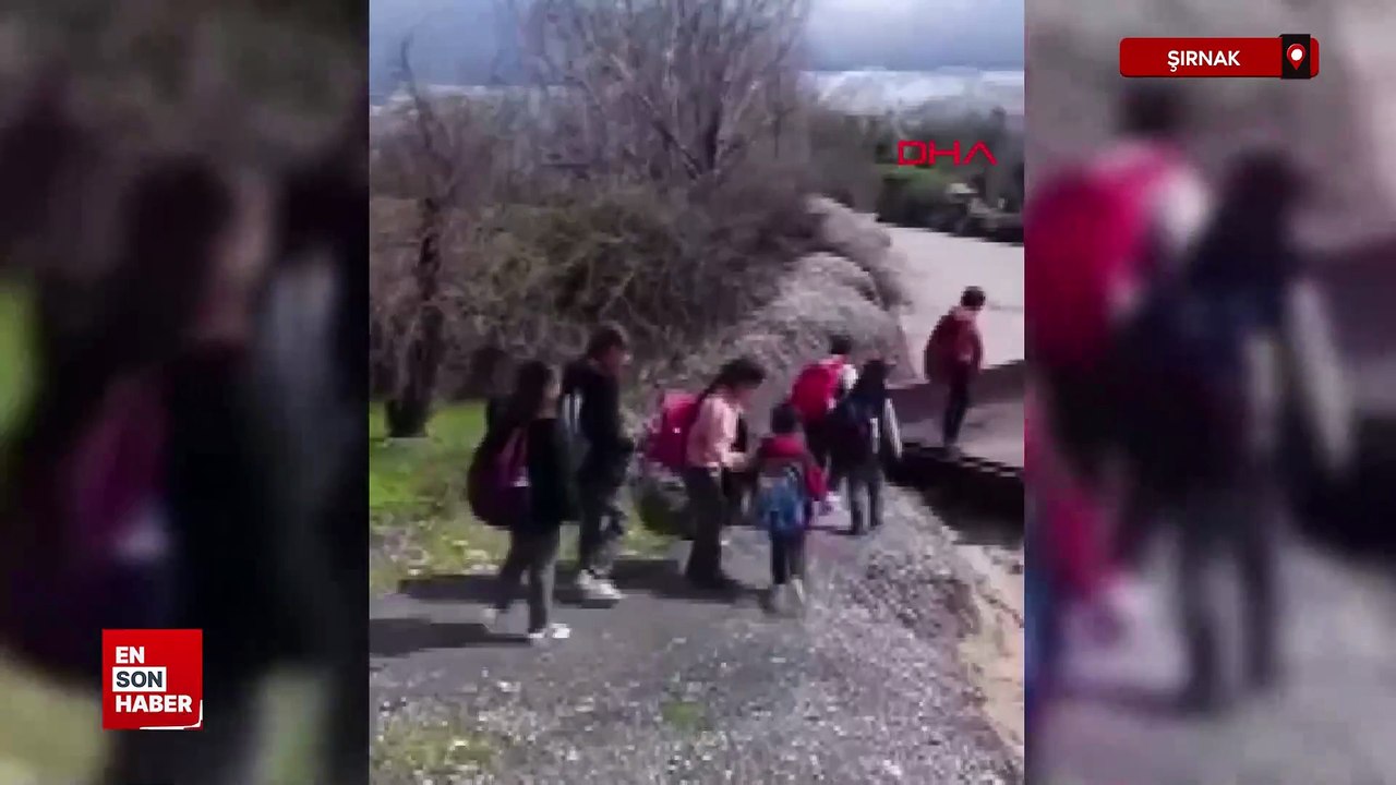 Şırnak'ta öğrenciler debisi yükselen dereyi traktörle geçti