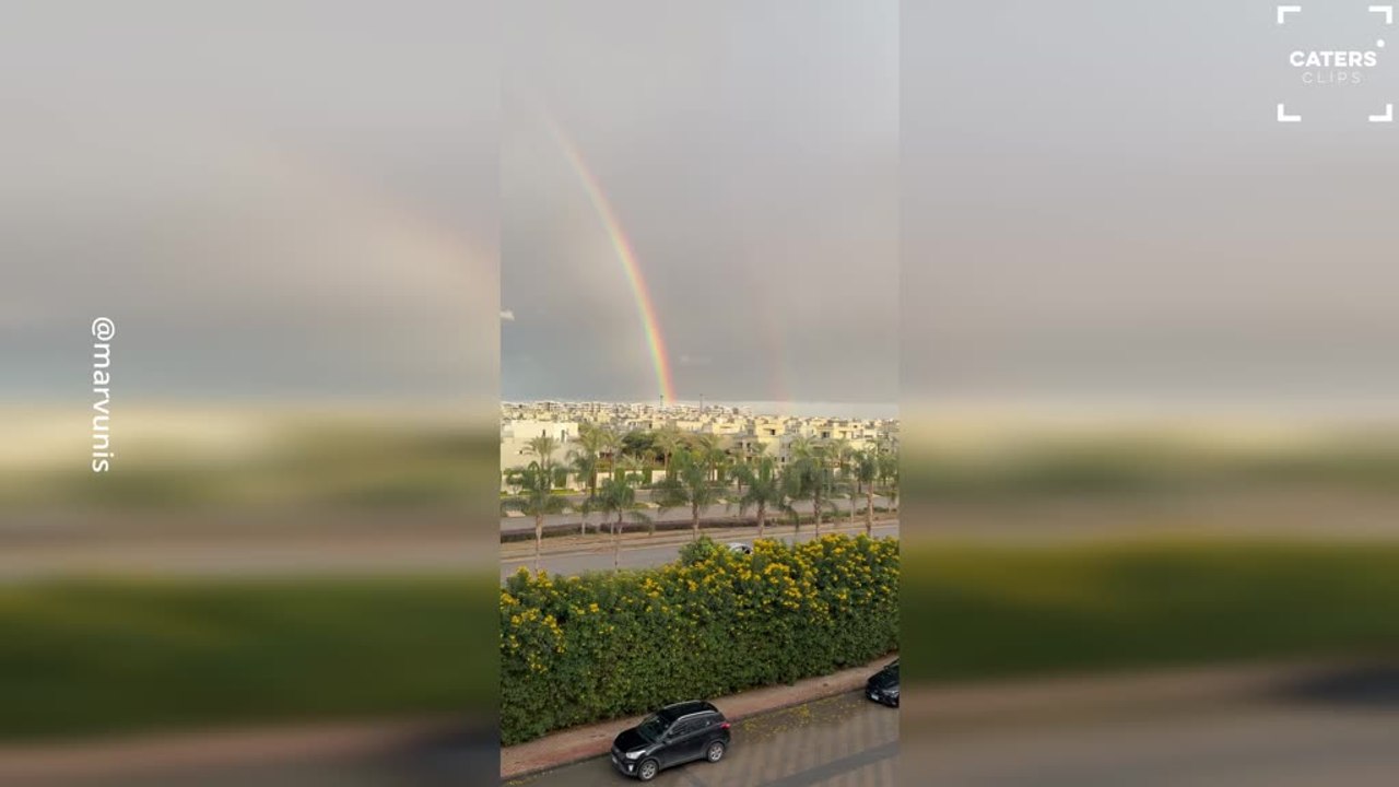 Double Rainbow Appears During Lightning Storm