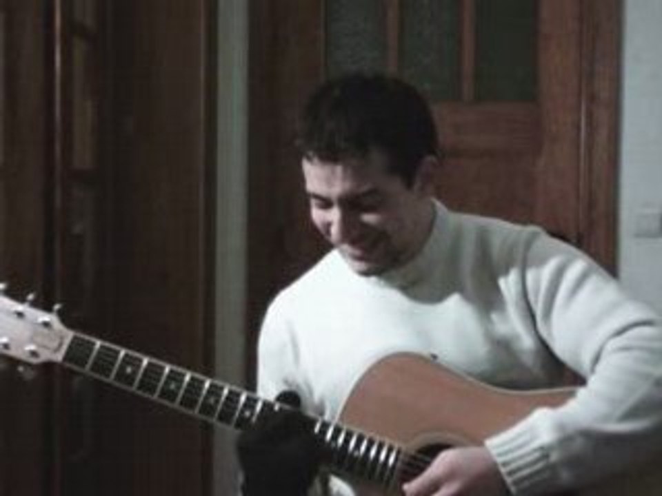 amazing guitar with a mitten (avec une moufle).