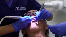 Dentists-to-be get experience by servicing the underprivileged