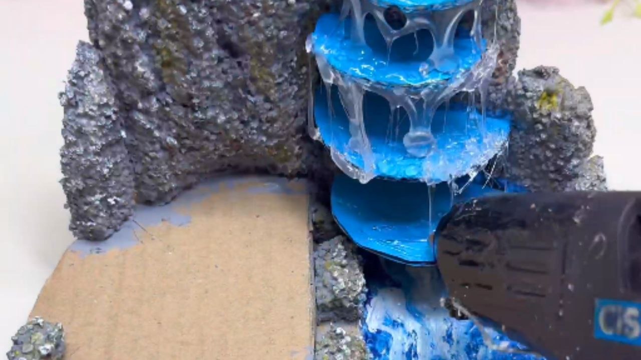Crafting a Mini House and Waterfall from Recycled Cartons