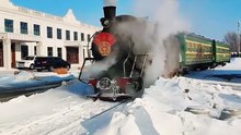 Vintage Steam Locomotive in Winter Snow