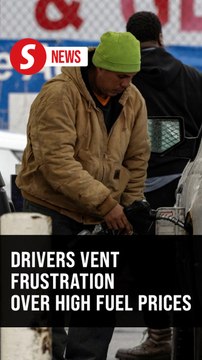'I blame Trump!' Chicago drivers wait hours for free gas as fuel prices soar