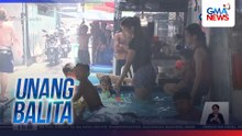 Kalsada, nagmistulang resort dahil sa hilera ng inflatable pools | Unang Balita