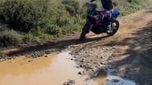 Conquer Muddy Trails_ Epic Motorcycle Adventure Through Puddles!