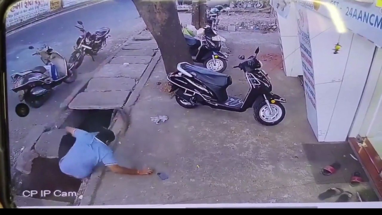 Shocking CCTV: Man Falls Through Collapsed Gutter in Gujarat