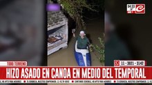 Pese a la crecida del río, decidió hacer un asado... ¡asistido por una canoa!