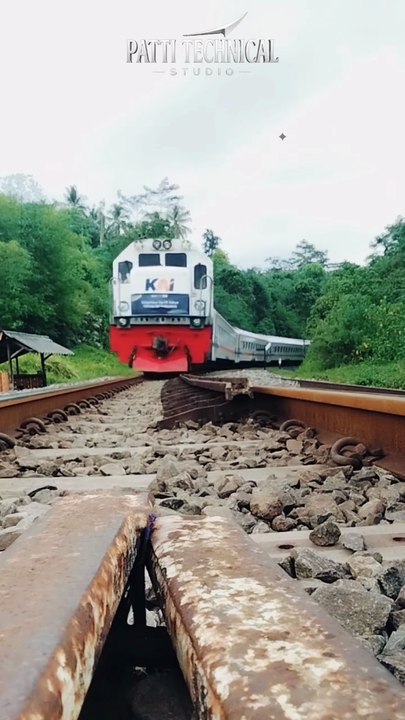 Majestic Indonesian KAI Train Navigating Through Green Hills