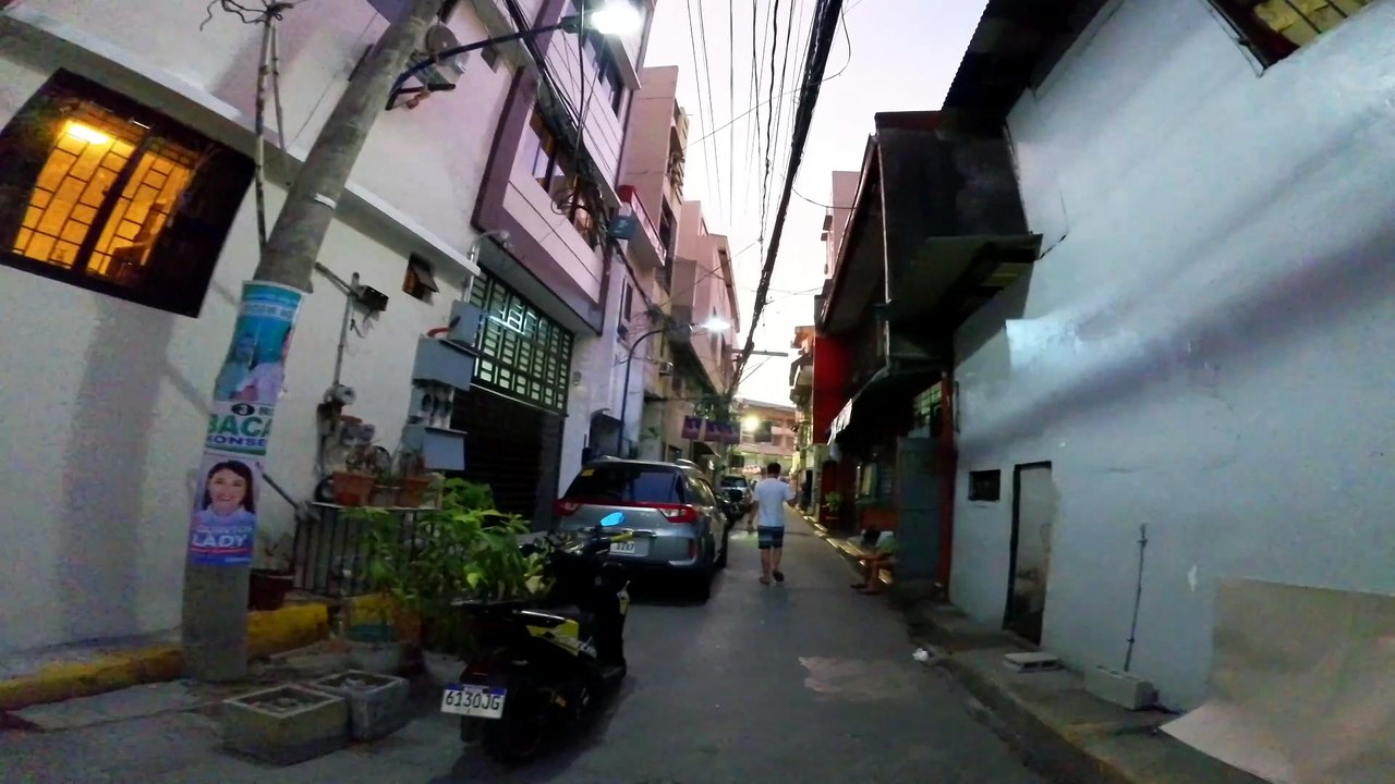 Nightfall on Adelina Street in Manila City, Philippines