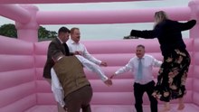 Man Falls While Getting Onto A Bouncy Castle At A Wedding