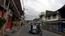 Laid Back Way of Life on Rizal Street in Los Banos, Laguna, Philippines