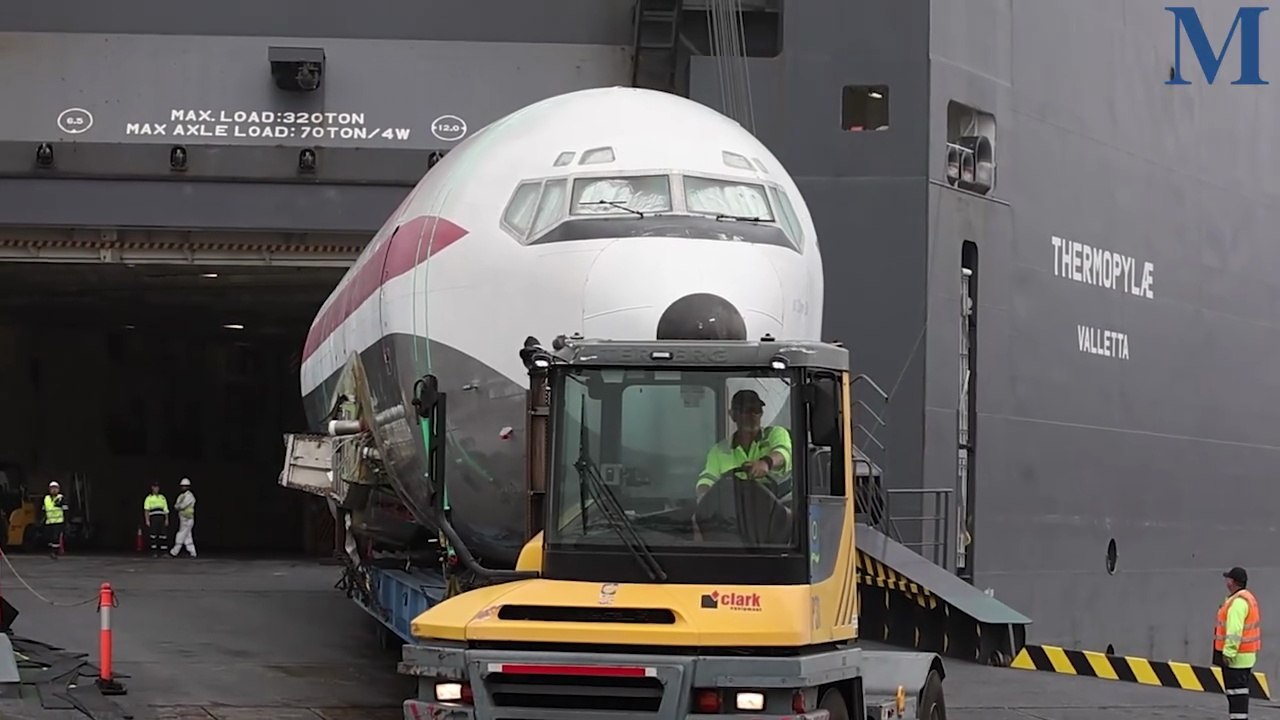 John Travolta’s former Qantas Boeing 707 arrives at Port Kembla harbour.