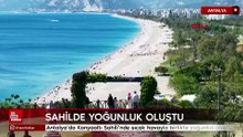Antalya’da Konyaaltı Sahili’nde sıcak havayla birlikte yoğunluk oluştu