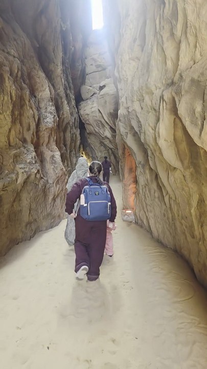 “Al Ula Travel Photography of Shalal Cafe with Narrow Trails and Canyon Views”