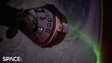 Time-Lapse Of Boeing Staliner Flying Over Auroras While Docked To Space Station