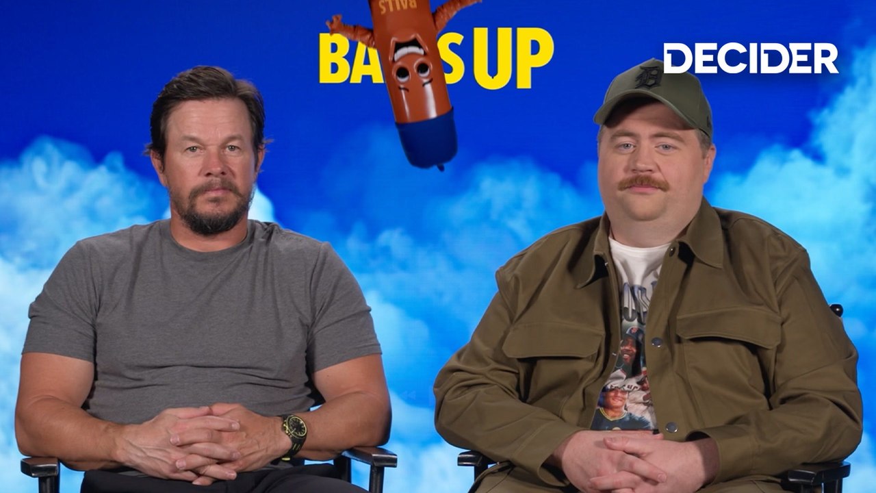 Mark Wahlberg & Paul Walter Hauser Talk Swallowing Condoms for Absurd 'Balls Up' Scene