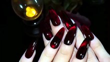 Dare to go dark? Slip into something wicked with our red cat eye. ❤️💀 — #pressonnails #nailsart #gothgirls #cateyenails #cateyegel