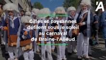 Carnaval de Braine-l'Alleud: gilles et paysannes défilent sous le soleil