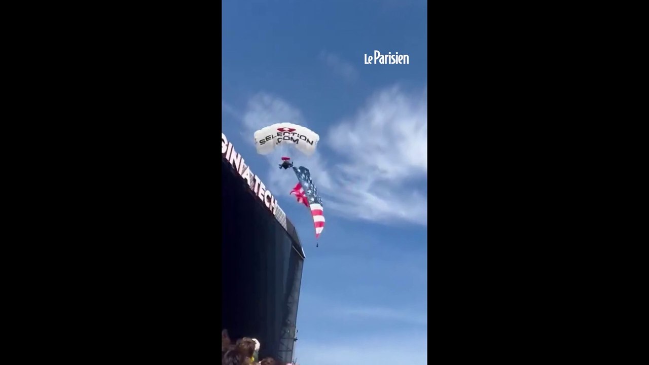 Un parachutiste s'écrase contre un écran géant
