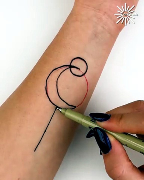 Ink meets creativity in this tattoo masterpiece 🖊️✨
