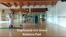 Headstand with balance pad