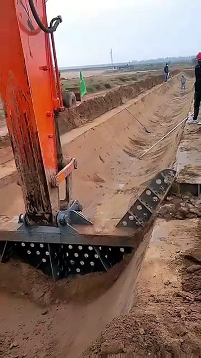 Irrigation ditch construction- Good tools and machinery make work easy