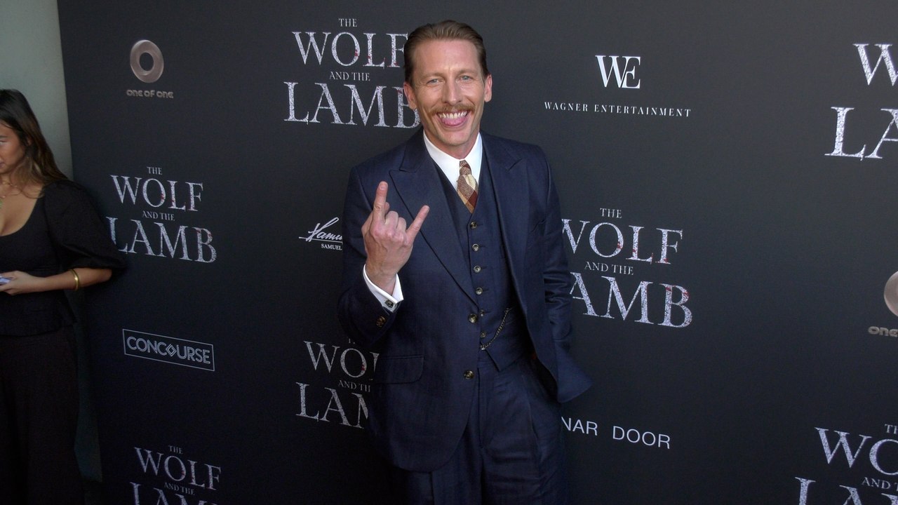 James Landry Hebert on the red carpet at the premiere of "The Wolf and the Lamb"