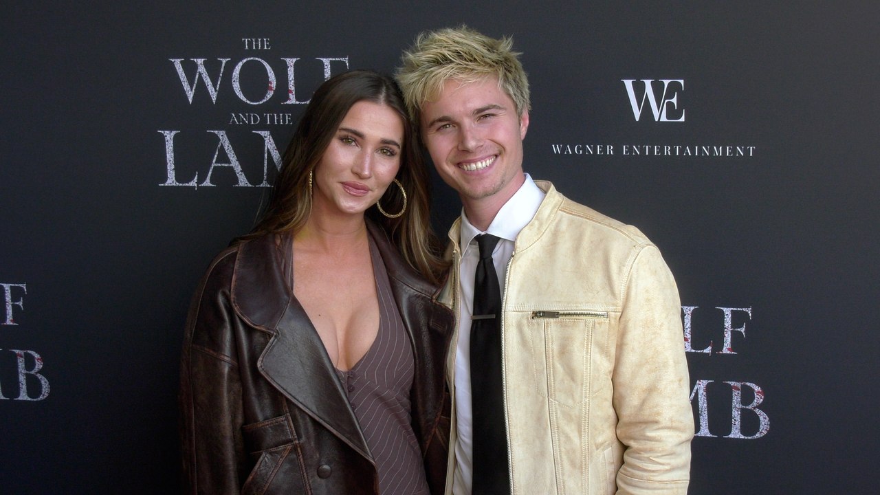 Auden Wyle and Elias Kacavas on the red carpet at the premiere of "The Wolf and the Lamb"
