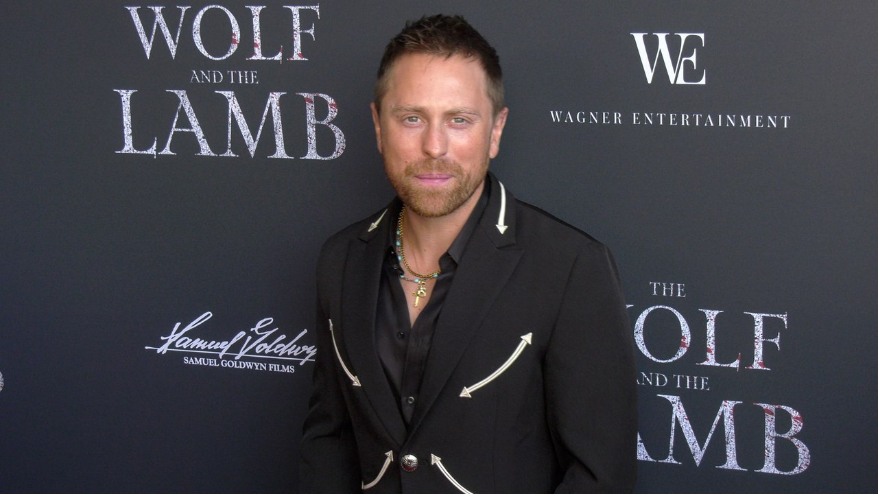 Eric Nelsen on the red carpet at the premiere of "The Wolf and the Lamb"