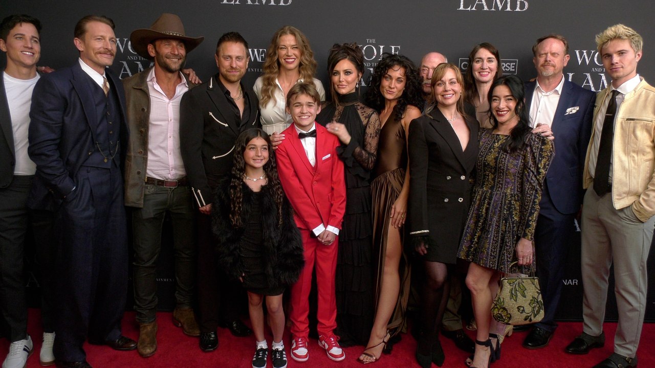 The cast of "The Wolf and the Lamb" poses together at their film's premiere in Los Angeles