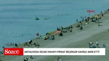 Antalya'da sıcak havayı fırsat bilenler sahile akın etti