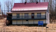 Chantier de la route 293 : deux maisons et un garage seront vendus à l'encan