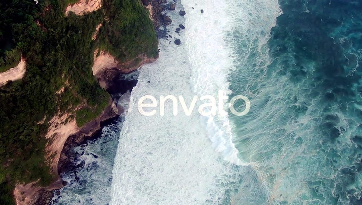 Aerial view of waves breaks on rocky shore. Seascape, rocks, ocean.