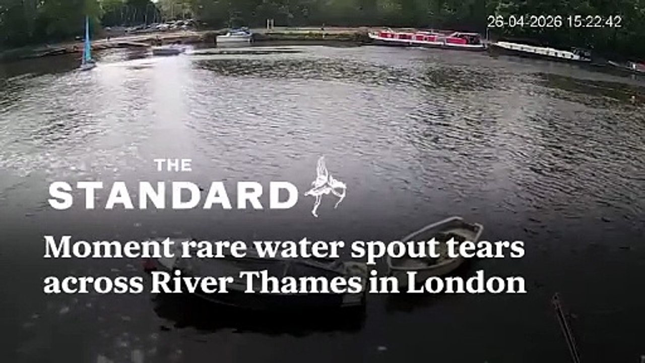 Moment rare water spout tears across River Thames