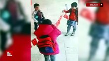 Erzurum'da ilkokul öğrencilerinin bayrak hassasiyeti yürekleri ısıttı