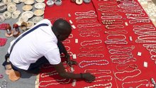 Benin artist turns waste paper into jewelry and home decor