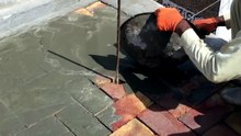 Concrete filling on tiles floor.