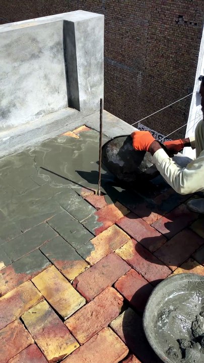 Concrete filling on tiles floor.