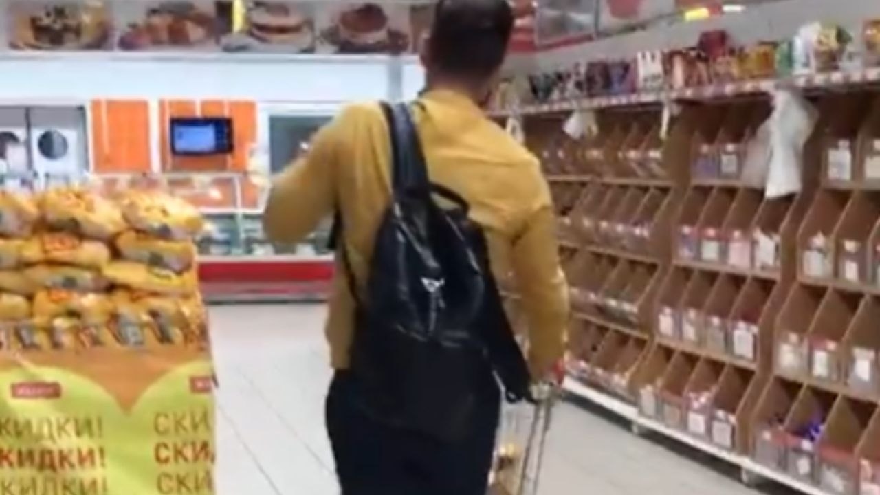 Boy Tries Riding A Shopping Cart And Takes A Fa...