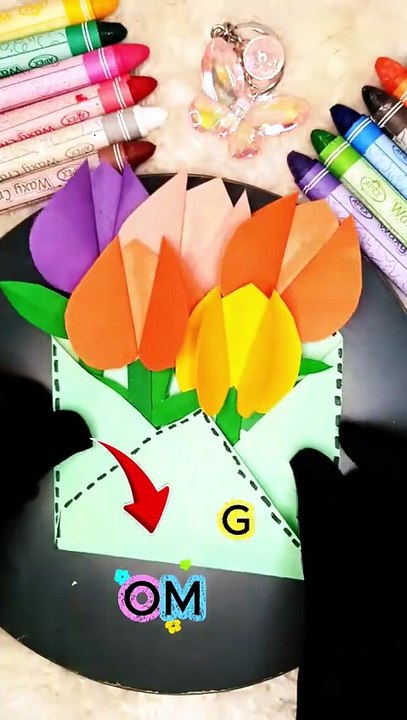 Colorful paper flowers in an envelope 🌸