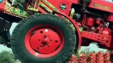 Belarus 510 tractor pulling heavy load