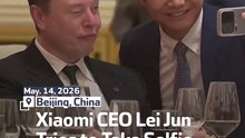 Xiaomi CEO Lei Jun Tries to Take Selfie with Elon Musk