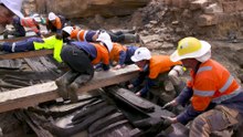 Archaeologists work to restore colonial-era boat found during construction of Barangaroo metro
